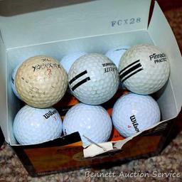 Club Champ Automatic Putting System for indoor practice and a box full of golf balls.