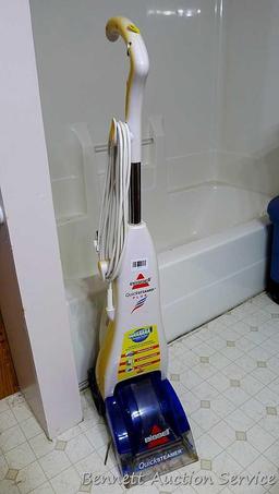 Bissell Quick Steamer Plus is 44" tall. Runs.