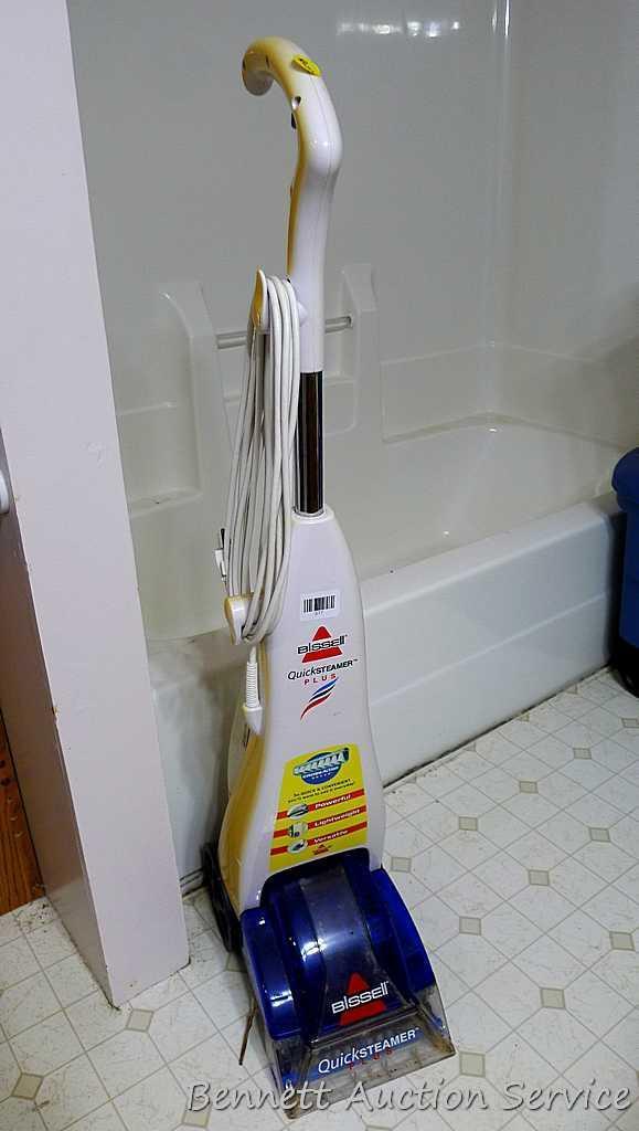 Bissell Quick Steamer Plus is 44" tall. Runs.