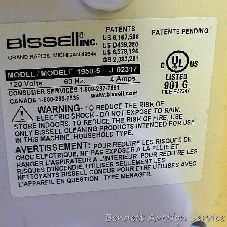 Bissell Quick Steamer Plus is 44" tall. Runs.