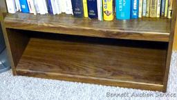 Sturdy wooden book shelf unit is 28" x 11-1/2" x 71" tall.