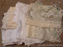 Lacy tablecloths, valances and curtain panels. 5-1/2' x 20" valance; 6' diameter table cloth; more.
