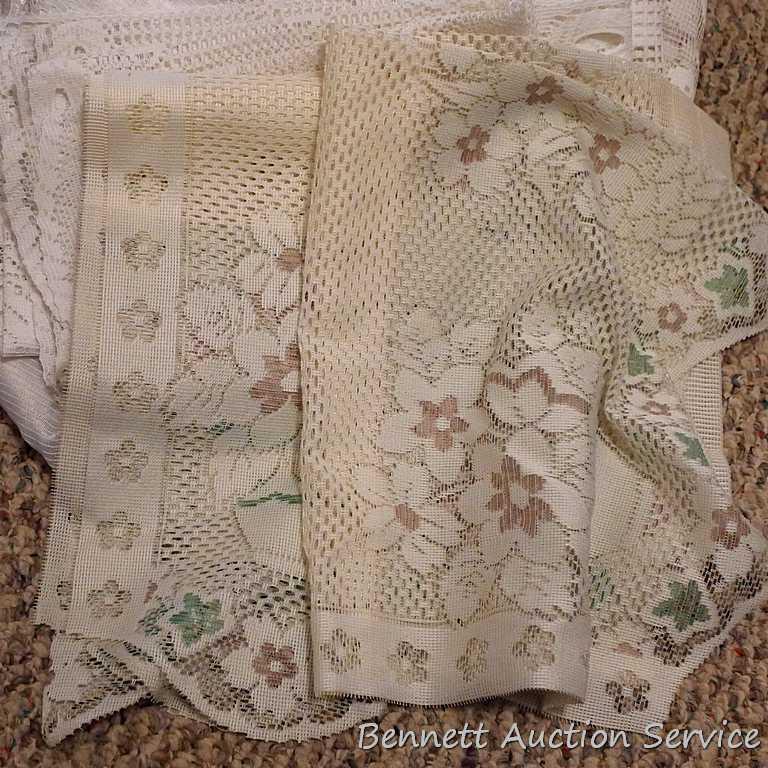 Lacy tablecloths, valances and curtain panels. 5-1/2' x 20" valance; 6' diameter table cloth; more.