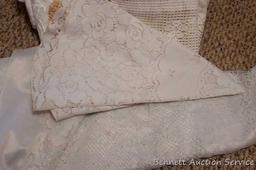 Lacy tablecloths, valances and curtain panels. 5-1/2' x 20" valance; 6' diameter table cloth; more.