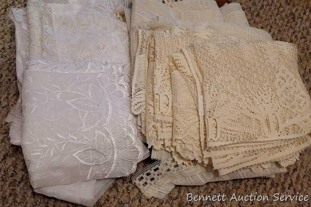 Lacy tablecloths, valances and curtain panels. 5-1/2' x 20" valance; 6' diameter table cloth; more.