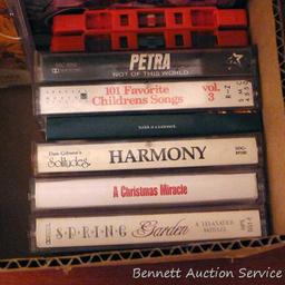 Fitness VHS tapes, plus some cassette tapes - some blank and new, some Christmas music, etc.;