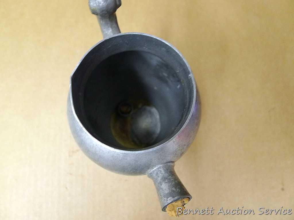 Pewter Paul Revere pitcher is 8-1/2" tall; other pewter pitcher has a cork stopper in spout;