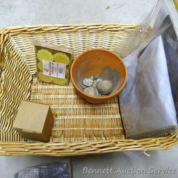 18" wide wicker basket filled with assorted cloth shopping bags, curtains, clay pot, etc.