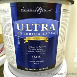 No shipping. Three partial 5 gallon buckets of paints including exterior house paint and textured
