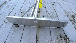 Roof rake has a 24" head; three poles are each about 5' long.
