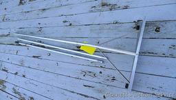 Roof rake has a 24" head; three poles are each about 5' long.