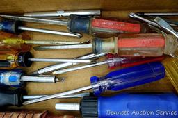 Lots of screw drivers and one 14-1/2" pry type bar.