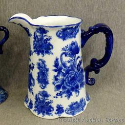 Beautiful decorative vase, oil lamp and music box; pitcher measures 9-1/2" x 9" tall. The 3 pieces