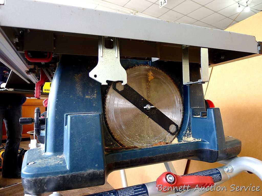 Bosch 4100, 10" table saw has miter gauge, heavy duty fence, push stick, side storage for extra