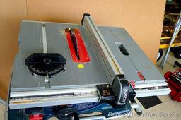 Bosch 4100, 10" table saw has miter gauge, heavy duty fence, push stick, side storage for extra