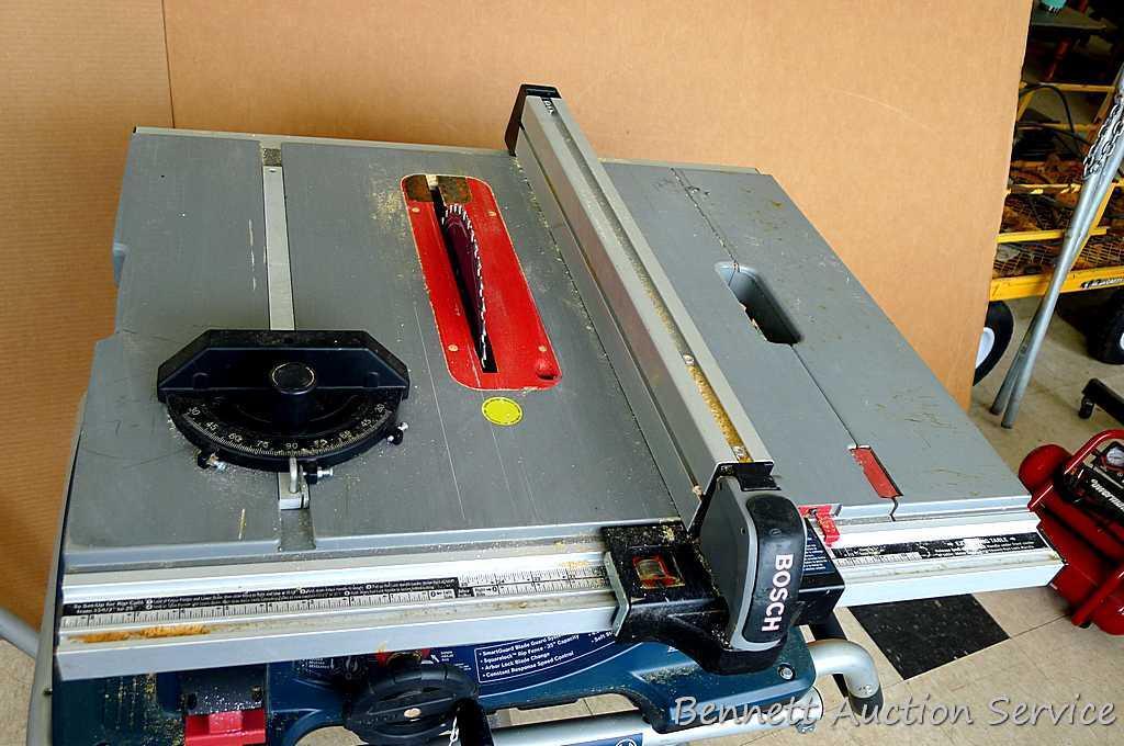 Bosch 4100, 10" table saw has miter gauge, heavy duty fence, push stick, side storage for extra