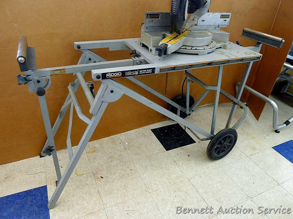 DeWalt 12" double bevel sliding compound miter saw is 36" long. It is bolted to a Ridgid AC9940