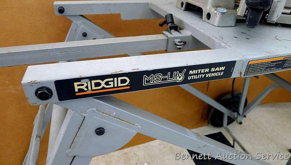 DeWalt 12" double bevel sliding compound miter saw is 36" long. It is bolted to a Ridgid AC9940