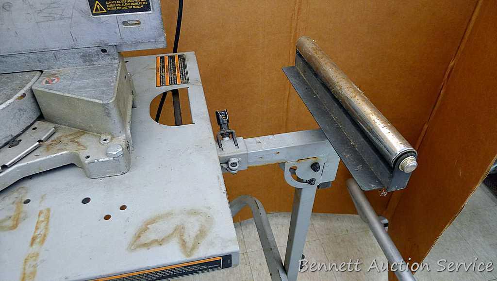 DeWalt 12" double bevel sliding compound miter saw is 36" long. It is bolted to a Ridgid AC9940
