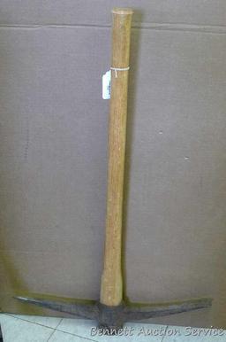 Master Mechanic 36" pick axe with hickory handle. Blade is 22-1/2" long.