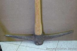 Master Mechanic 36" pick axe with hickory handle. Blade is 22-1/2" long.