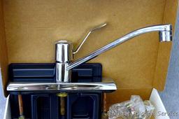Moen single handle chrome kitchen faucet with hose spray #87130.