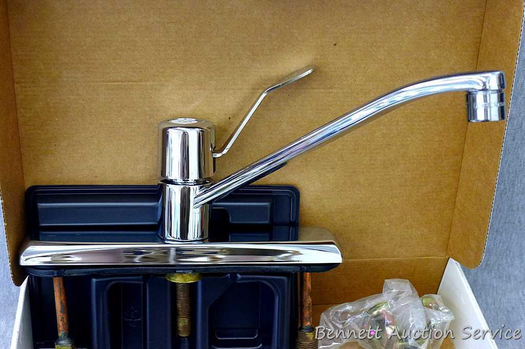 Moen single handle chrome kitchen faucet with hose spray #87130.