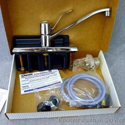 Moen single handle chrome kitchen faucet with hose spray #87130.