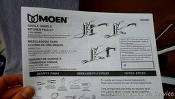 Moen single handle chrome kitchen faucet with hose spray #87130.