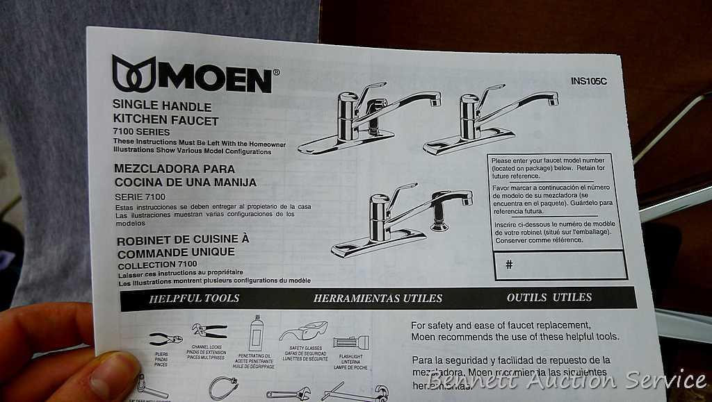 Moen single handle chrome kitchen faucet with hose spray #87130.