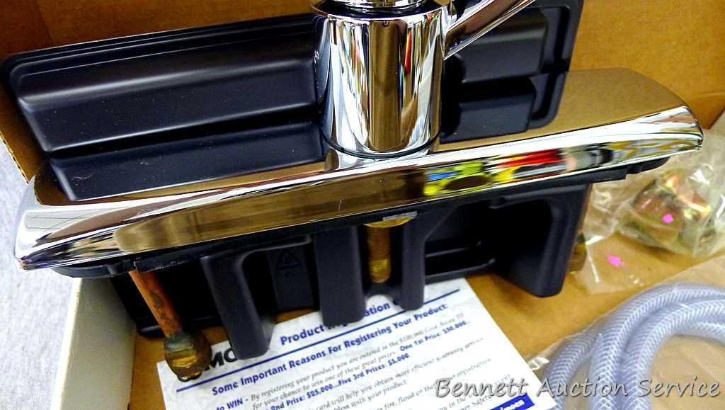 Moen single handle chrome kitchen faucet with hose spray #87130.