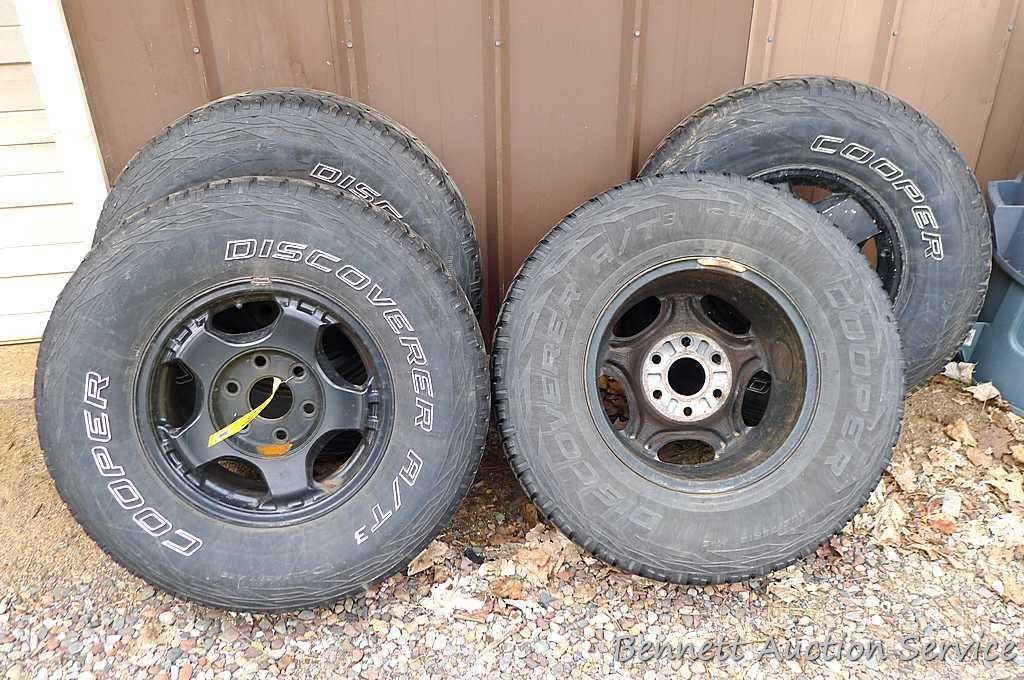 Set of Cooper Discover A/T3 tires came off of a 1998 GMC truck. 265/75R16 M+S, 116T standard load.