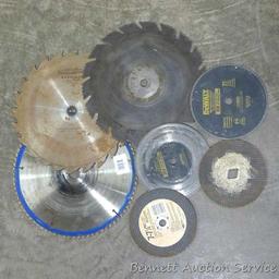 Craftsman and other 12" carbide and combination circular saw blades have 1" and 3/4" center holes;