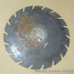 Craftsman and other 12" carbide and combination circular saw blades have 1" and 3/4" center holes;