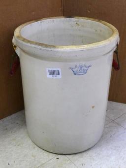 Antique blue crown 8 gallon crock with handles; measures 14' X 17". Has crazing, chip near handle,