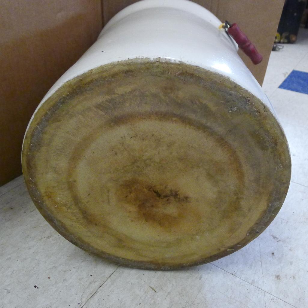 Antique blue crown 8 gallon crock with handles; measures 14' X 17". Has crazing, chip near handle,
