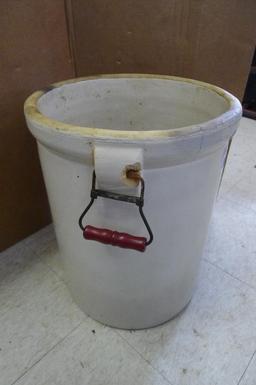 Antique blue crown 8 gallon crock with handles; measures 14' X 17". Has crazing, chip near handle,