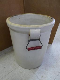 Antique blue crown 8 gallon crock with handles; measures 14' X 17". Has crazing, chip near handle,
