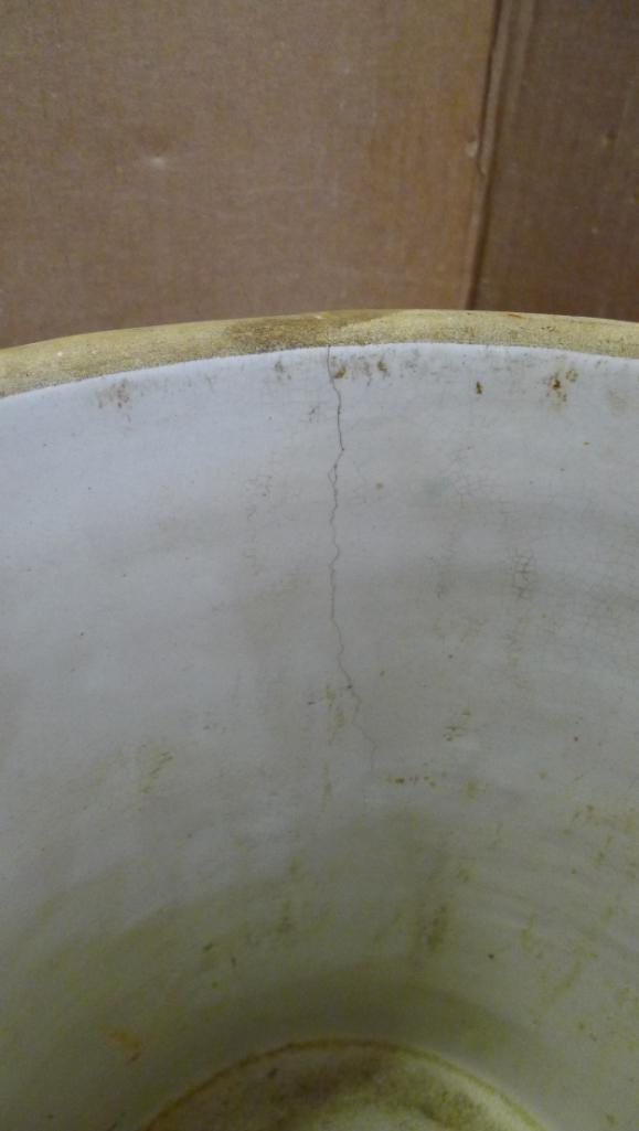 Antique blue crown 8 gallon crock with handles; measures 14' X 17". Has crazing, chip near handle,
