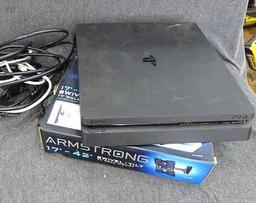 Sony Play Station 4, Armstrong 17"-42" swivel TV wall mount, and a bag of cords. PS4 turns on and is