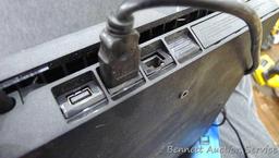 Sony Play Station 4, Armstrong 17"-42" swivel TV wall mount, and a bag of cords. PS4 turns on and is
