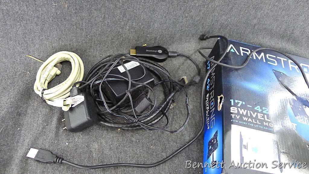 Sony Play Station 4, Armstrong 17"-42" swivel TV wall mount, and a bag of cords. PS4 turns on and is