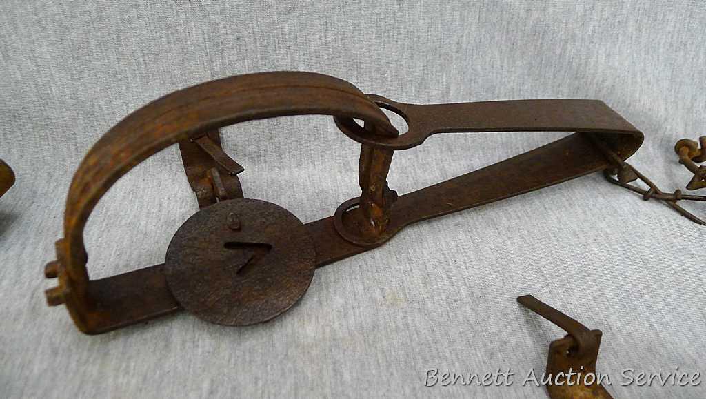 Five Victor cast jaw traps including numbers 0, 1, 1-1/2 single spring traps; Plus another similar