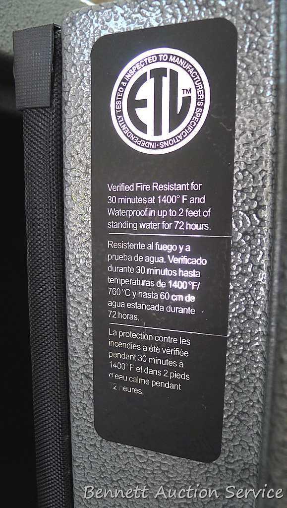 Sentinel electronic combination gun safe by Stack On comes with a key, door mounted handgun sleeve