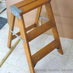 Nice sturdy folding step stool.12-1/2" x 22-1/2" tall.