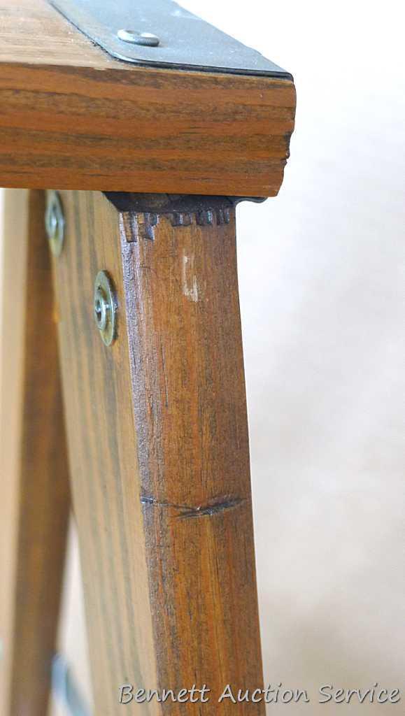 Nice sturdy folding step stool.12-1/2" x 22-1/2" tall.