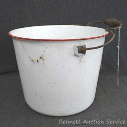 Red and white enameled would look great full of flowers or balsam branches for Christmas. Has a