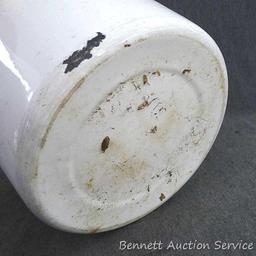 Red and white enameled would look great full of flowers or balsam branches for Christmas. Has a