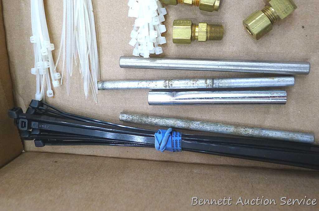 Self tapping saddle valve, zip ties, wire, saddle clamp, and copper tubing connectors. Longest zip