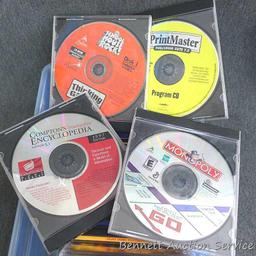 Box of computer game cd's whitetail hunting game, pin ball science, toy story, new ways things work,